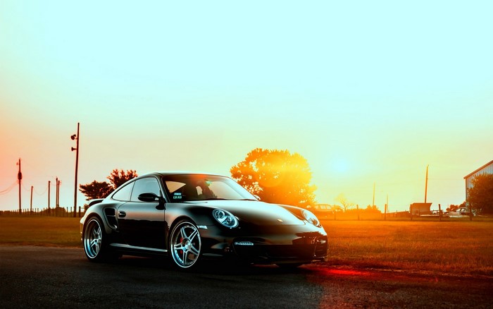 Black Porsche 911 997 at Sunset