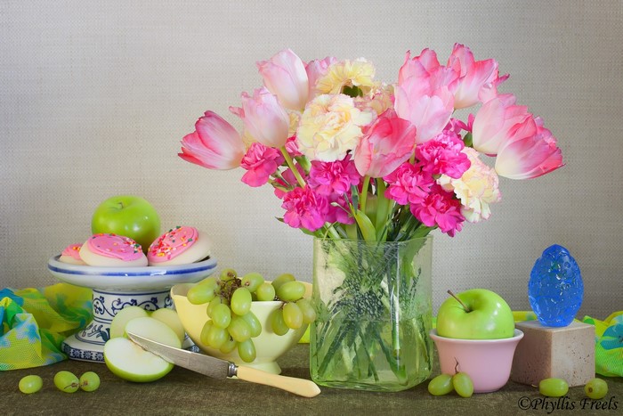 Still life with fruit, cookies, and flowers