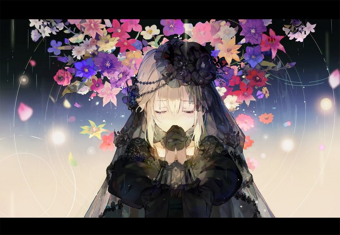 Girl in Gothic Lolita dress with flowers