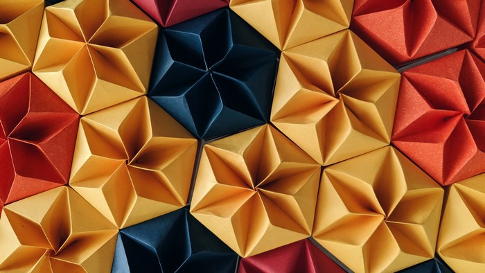Colorful origami stars in red, yellow, and blue