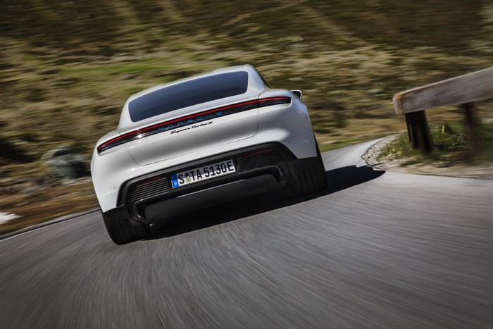 Porsche Taycan Turbo S driving on a mountain road