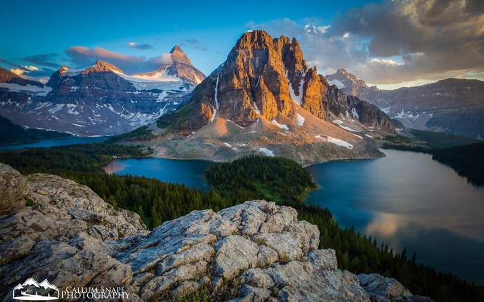Mountain peaks and lakes at sunset