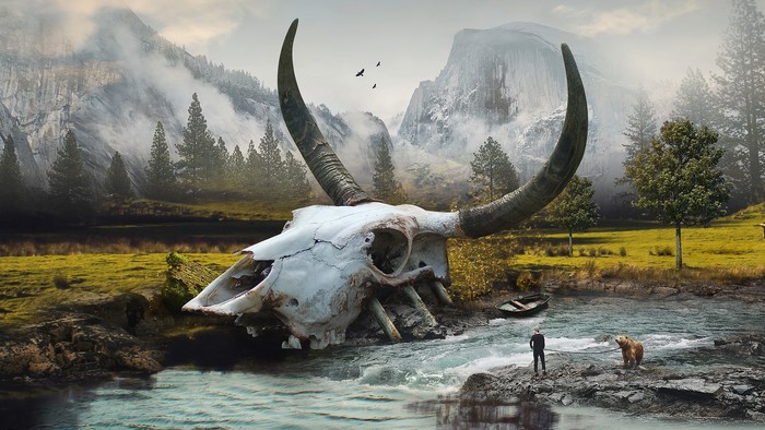 Giant bull skull in a mountain landscape with a bear and a person