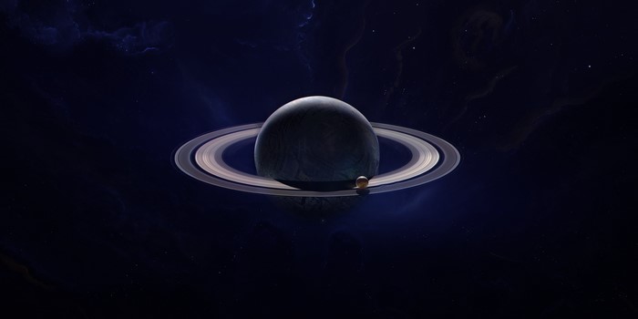 Planet with rings and a moon in space