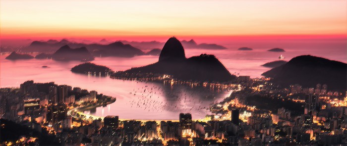 Rio de Janeiro cityscape at sunset with Sugarloaf Mountain