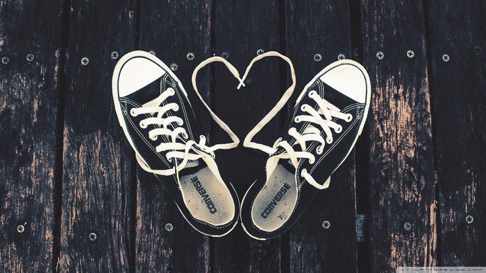 Converse sneakers forming a heart shape