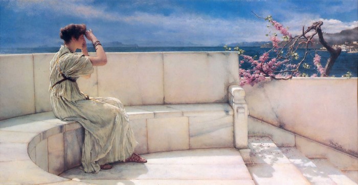 Woman on a marble bench overlooking the sea