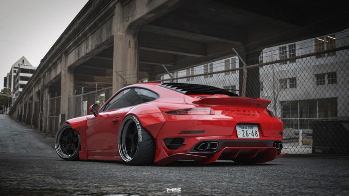 Red Porsche 911 Turbo S with widebody kit