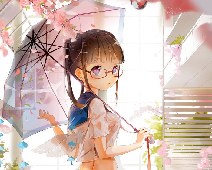 Girl with glasses holding an umbrella with flowers