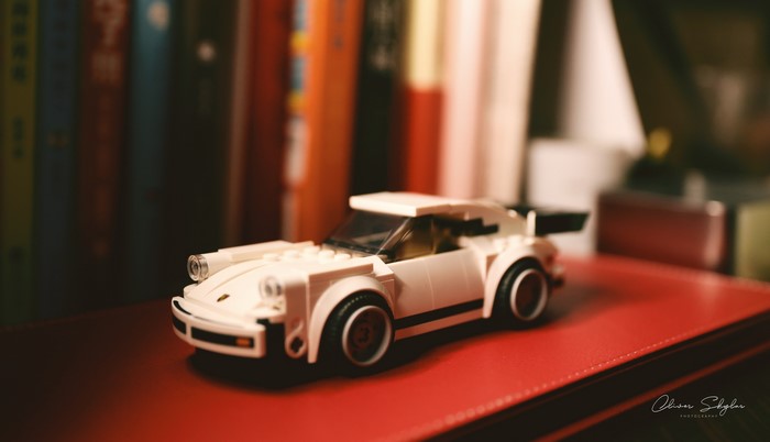 White LEGO Porsche 911 on a red surface