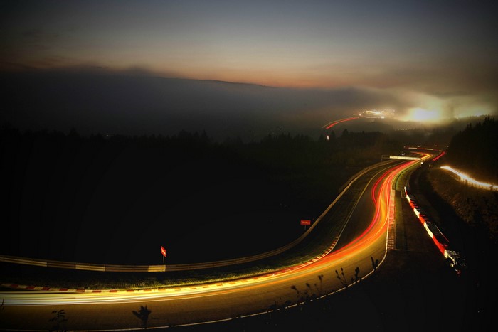 Long exposure of a race track at night with light trails
