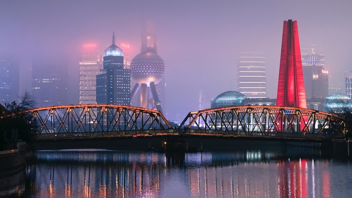 Waibaidu Bridge over Huangpu River in Shanghai at Night