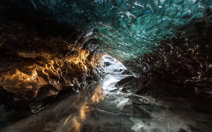 Ice cave with water and light