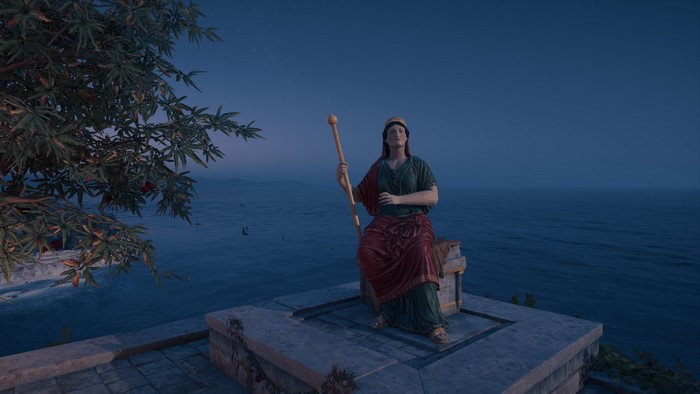 Statue of a woman holding a staff in Assassin's Creed Odyssey