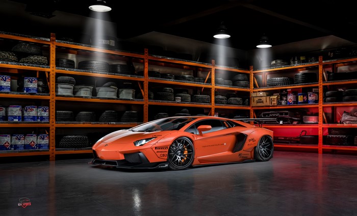 Orange Lamborghini Aventador with bolt-on fender flares