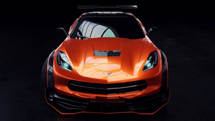 Orange Chevrolet Corvette with a spoiler