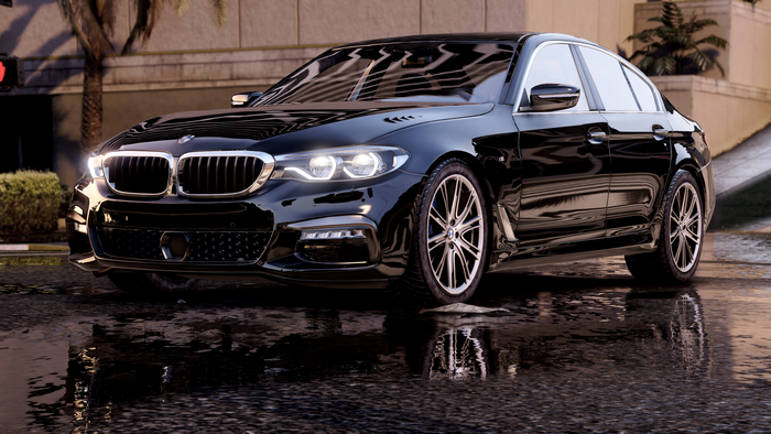 Black BMW 5 Series G30 Sedan on Wet Road
