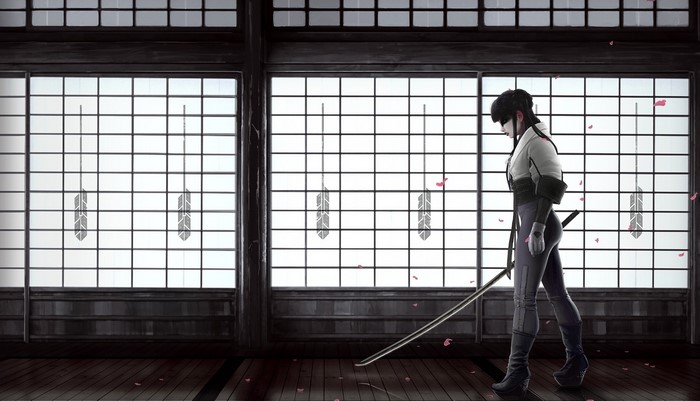 Woman with katana in traditional Japanese room