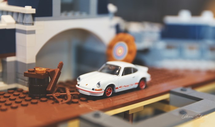 White Porsche 911 LEGO diorama with barrel