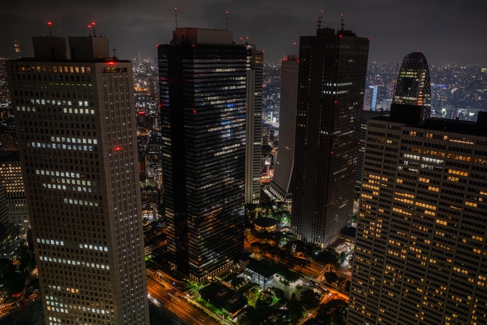 Tokyo cityscape at night with illuminated skyscrapers