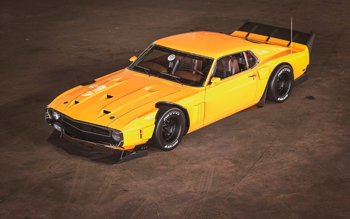 Yellow custom Ford Mustang with racing spoiler