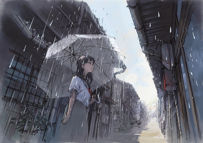Girl in school uniform holding umbrella in the rain