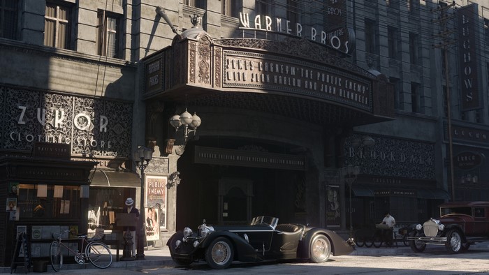 Warner Brothers Theatre with vintage cars and clothing store