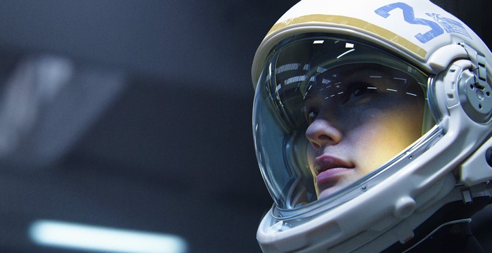 Woman in astronaut helmet with number 3