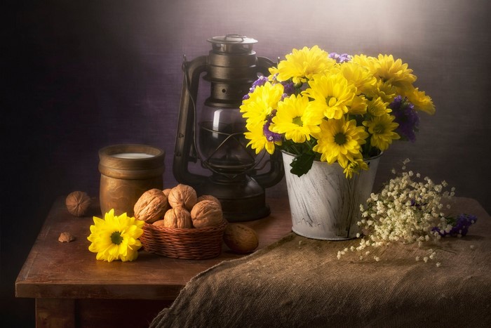 Still life with flowers, nuts, and lantern