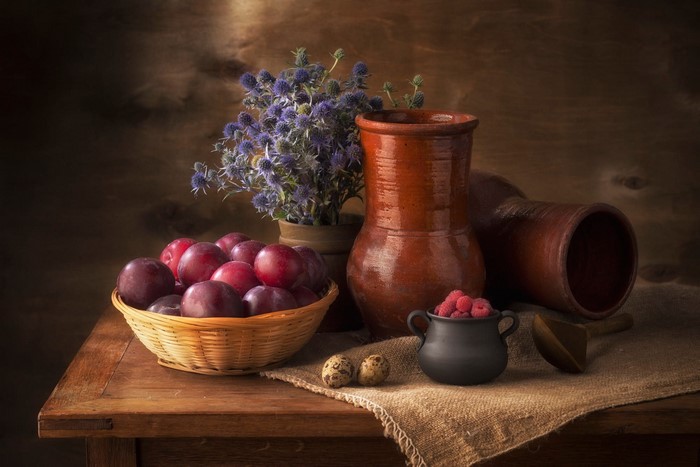 Still life with plums, raspberries, flowers, and pottery