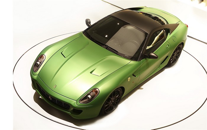 Green Ferrari 599 GTB Fiorano on a turntable