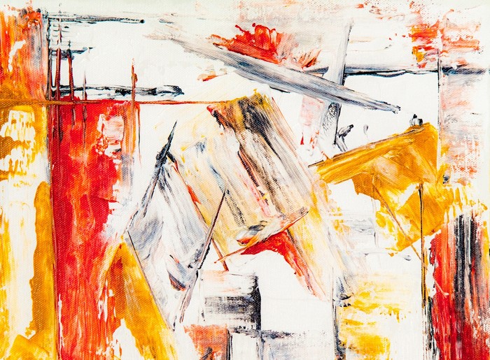 Abstract painting with bold brushstrokes in red, yellow, and white