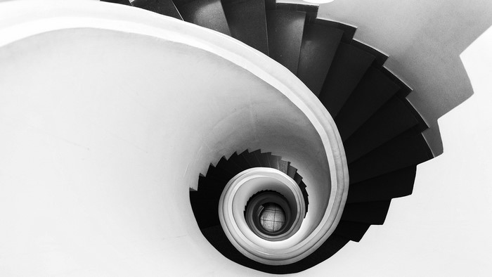 Monochrome spiral staircase architecture