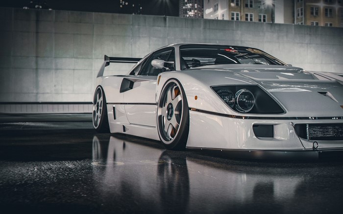 White Ferrari F40 parked in a concrete structure