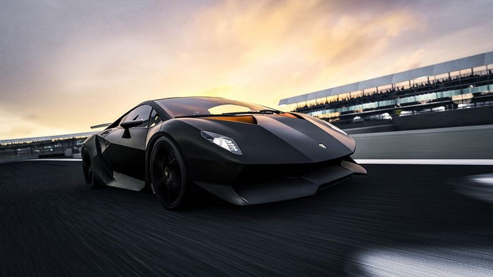 Black Lamborghini Aventador on a race track