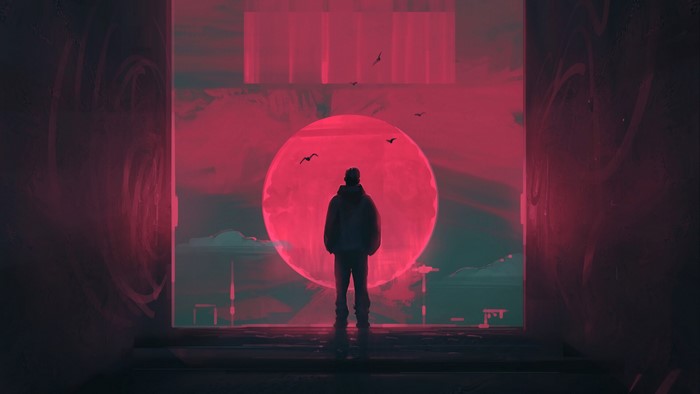 Man standing before a large red moon