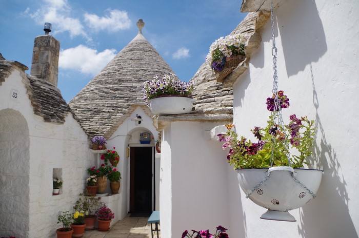 Puglia Italy Trulli houses with flowers