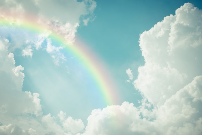 Rainbow and clouds in the sky