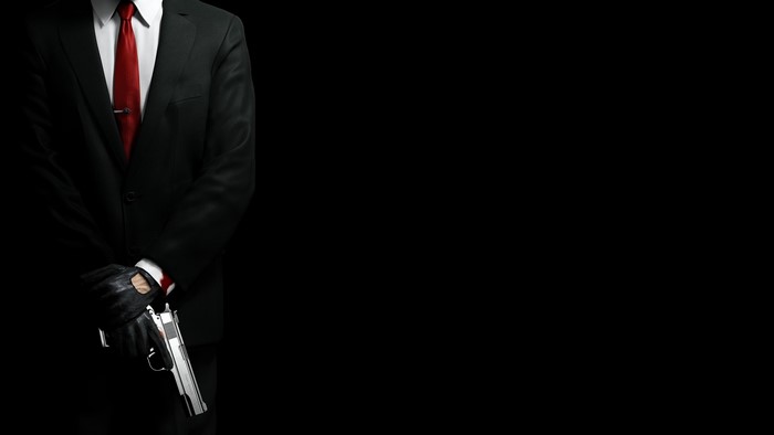 Agent 47 from Hitman holding a pistol