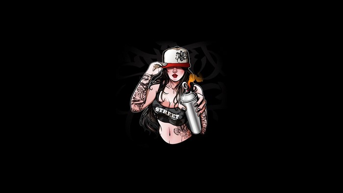 Woman with tattoos holding a spray can