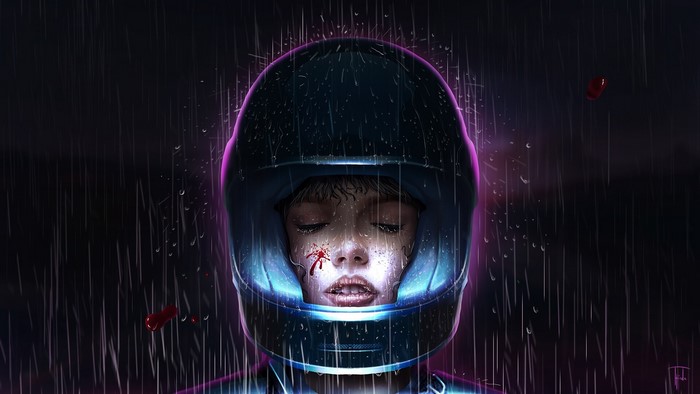 Woman in helmet in the rain