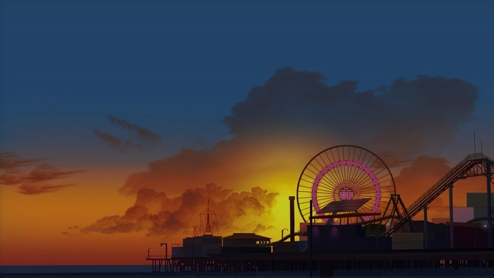 Ferris wheel and roller coaster at sunset
