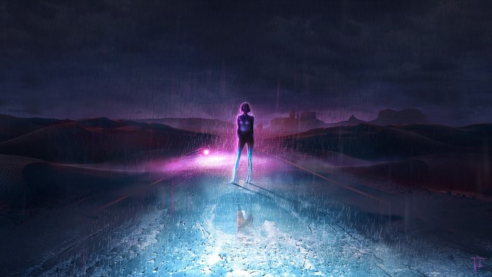 Woman standing on a wet road in the desert at night
