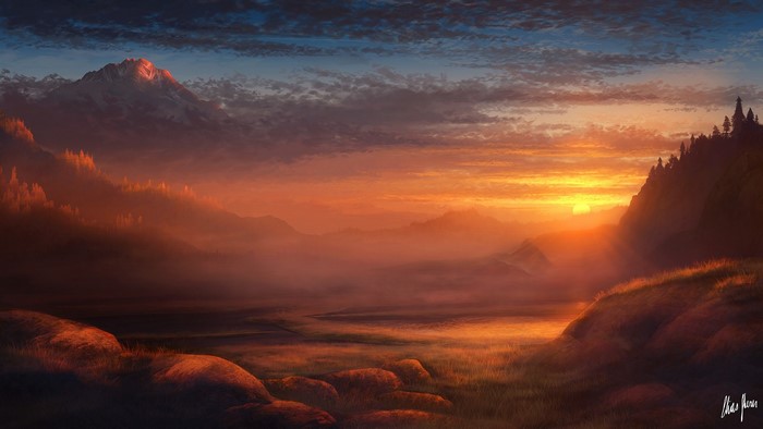 Mountain landscape at sunset with mist
