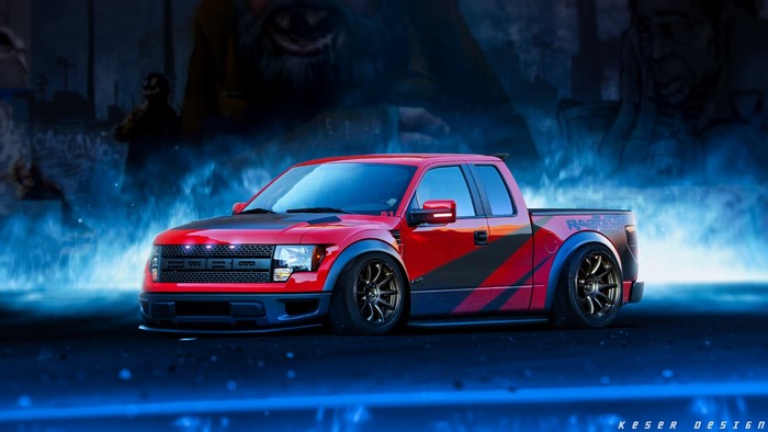 Red Ford Raptor truck with custom graphics