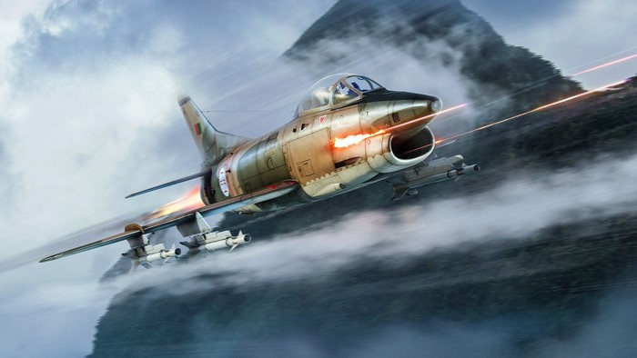 Fiat G.91 military aircraft firing missiles