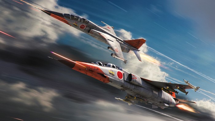 Two Mitsubishi T-2 fighter jets in flight