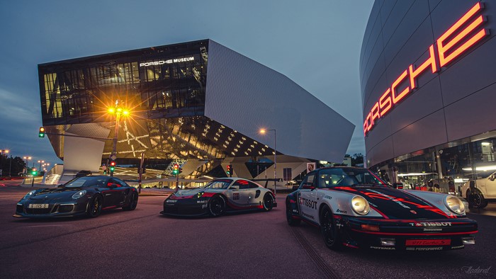 Porsche Museum with three Porsche cars