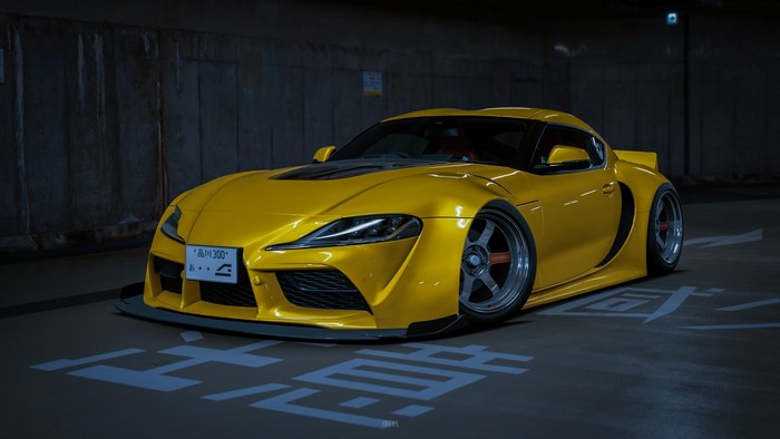 Yellow Toyota Supra with custom body kit