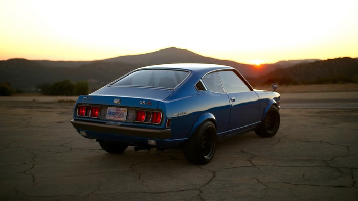 Blue Mitsubishi Galant GS-R coupe at sunset